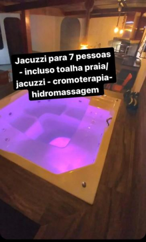 Casa Nova cJacuzzi 200m da praia no Guarujá na praia do Pernambuco 100m da Casa festas 170